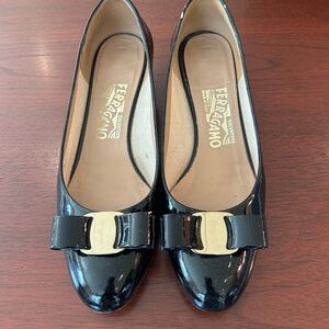 Salvatore Ferragamo Black Patent Leather Flats with Gold Accent